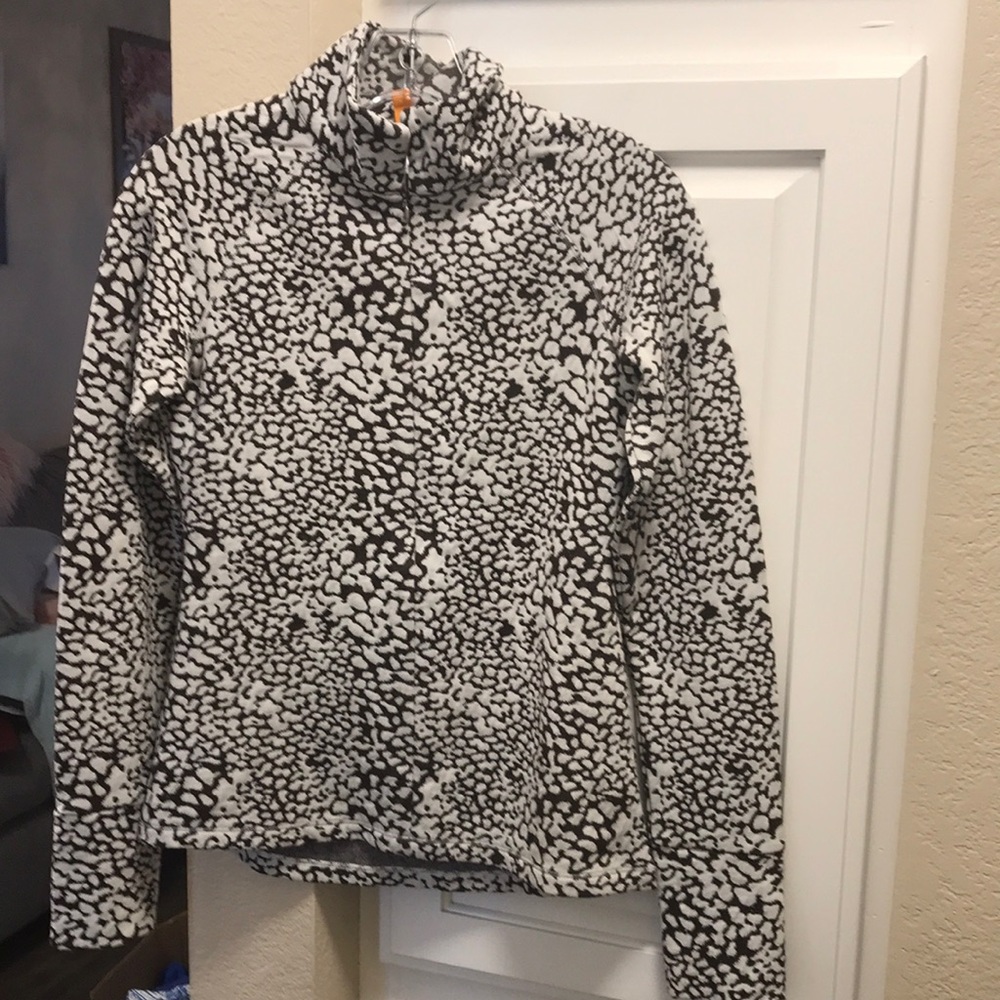 Lucy brown and cream animal print half zip mock turtleneck
